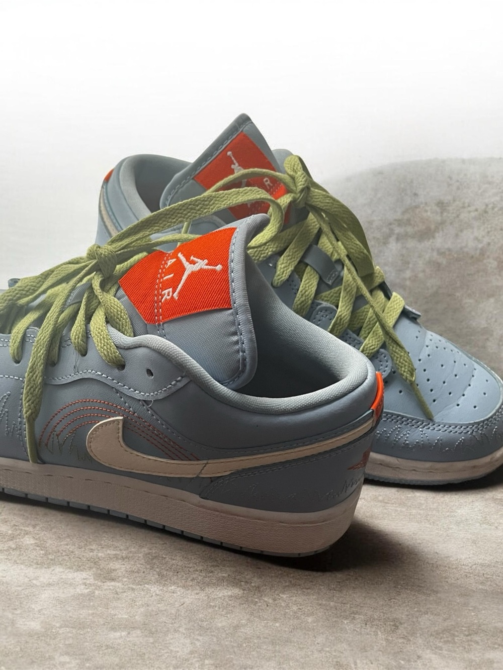 Jordan Low-Top Sneakers in Light Blue with Orange Accents